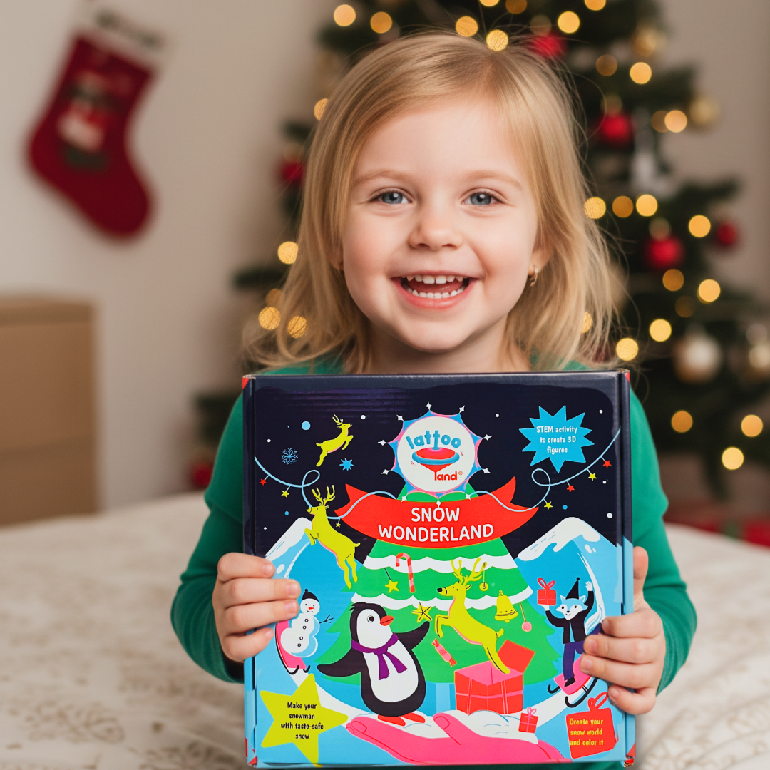 Child holding a Christmas toy titled 'Snow Wonderland' with Christmas decorations in the background