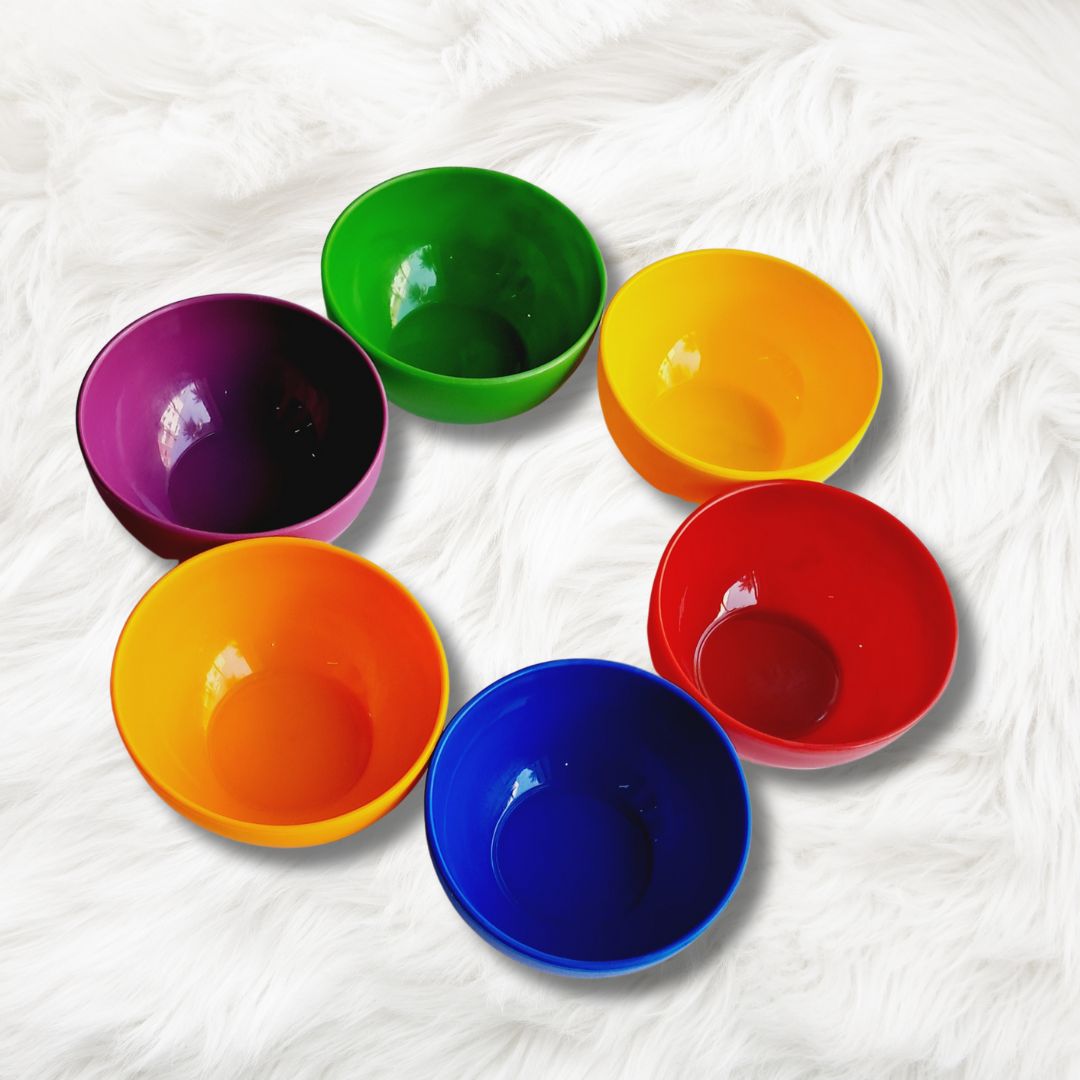 Educational sorting toys for preschoolers, featuring colorful cups for early learning and sensory exploration.Coloured cups for kids