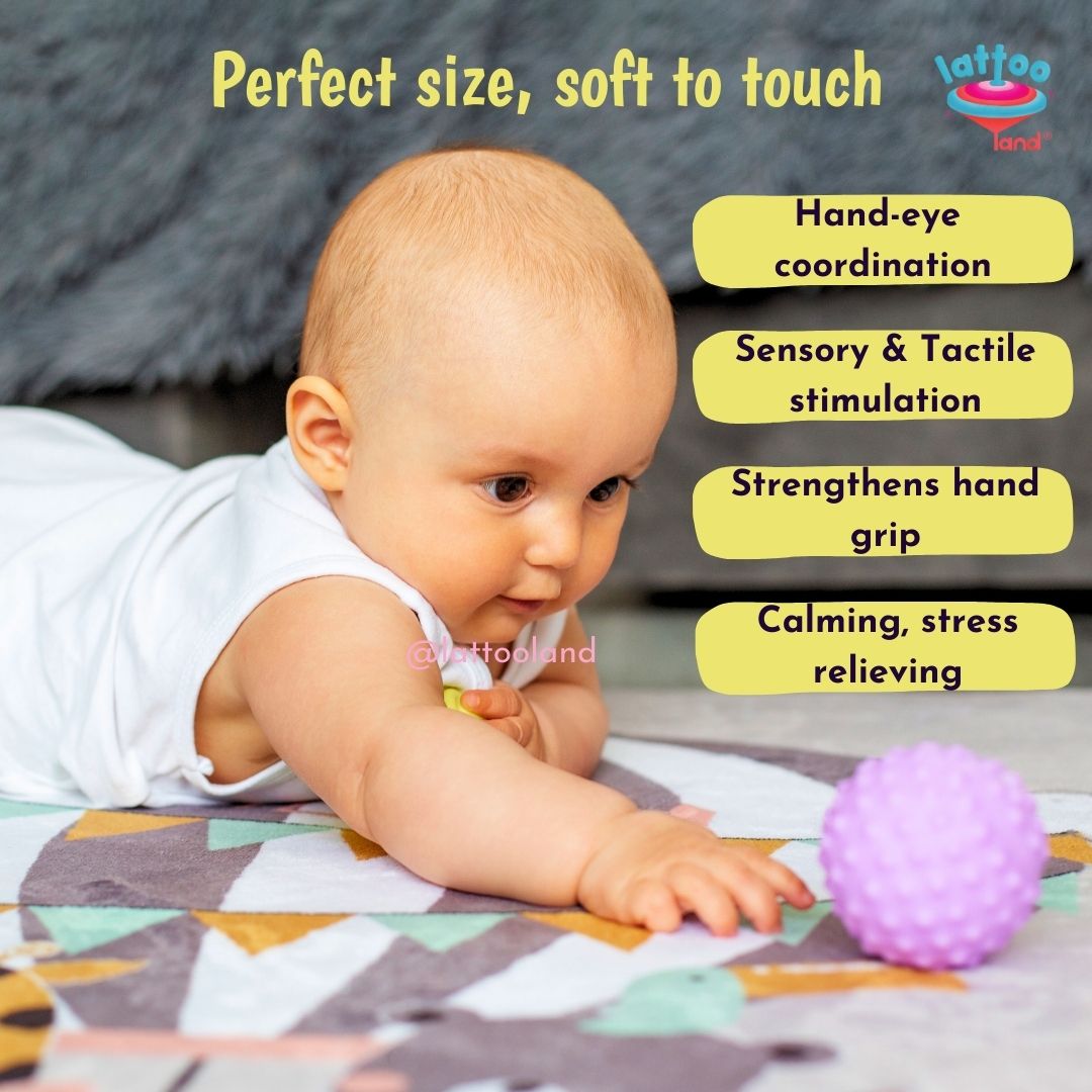 Babies interacting with sensory balls, experiencing safe tactile exploration and gaining early developmental skills.