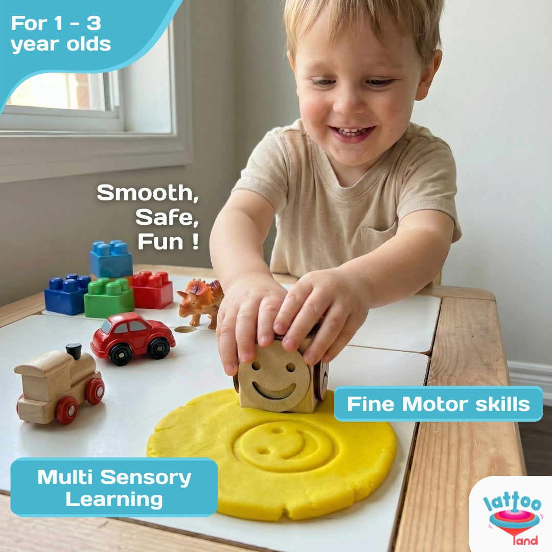 Kids engaging in activity with emotion stamps on paper and play dough.