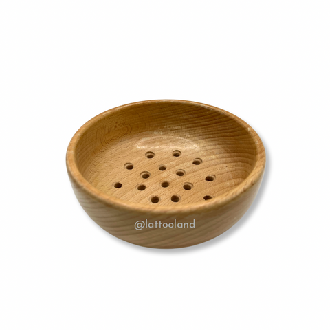 Durable wooden sensory sieve toy for children to develop sorting skills and coordination.