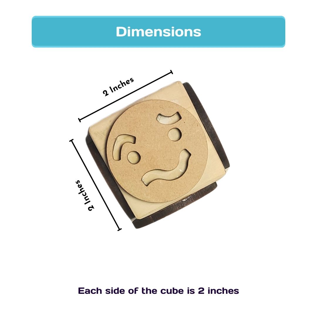 Wooden emotion stamping cube for preschool emotional learning activities.