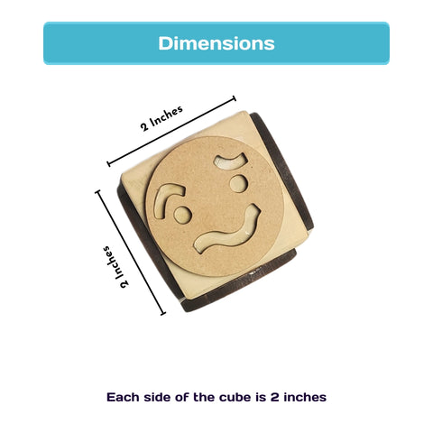 Wooden emotion stamping cube for preschool emotional learning activities.