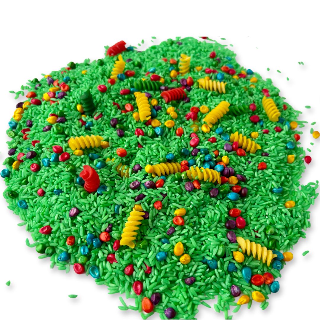 Bright spring-themed sensory bin filler with colored rice, corn, and pasta for kids’ creative play.


