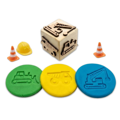 Wooden construction vehicles stamp dice for kids to stamp on paper, play dough, and cloth.