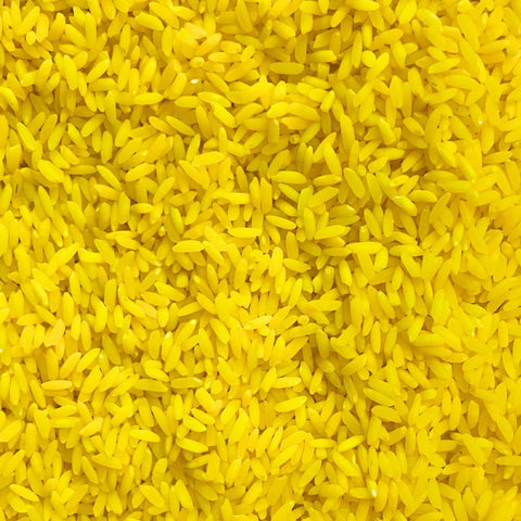 Refill pack for sensory rice, offering a variety of eco-friendly and safe yellow colored rice for play