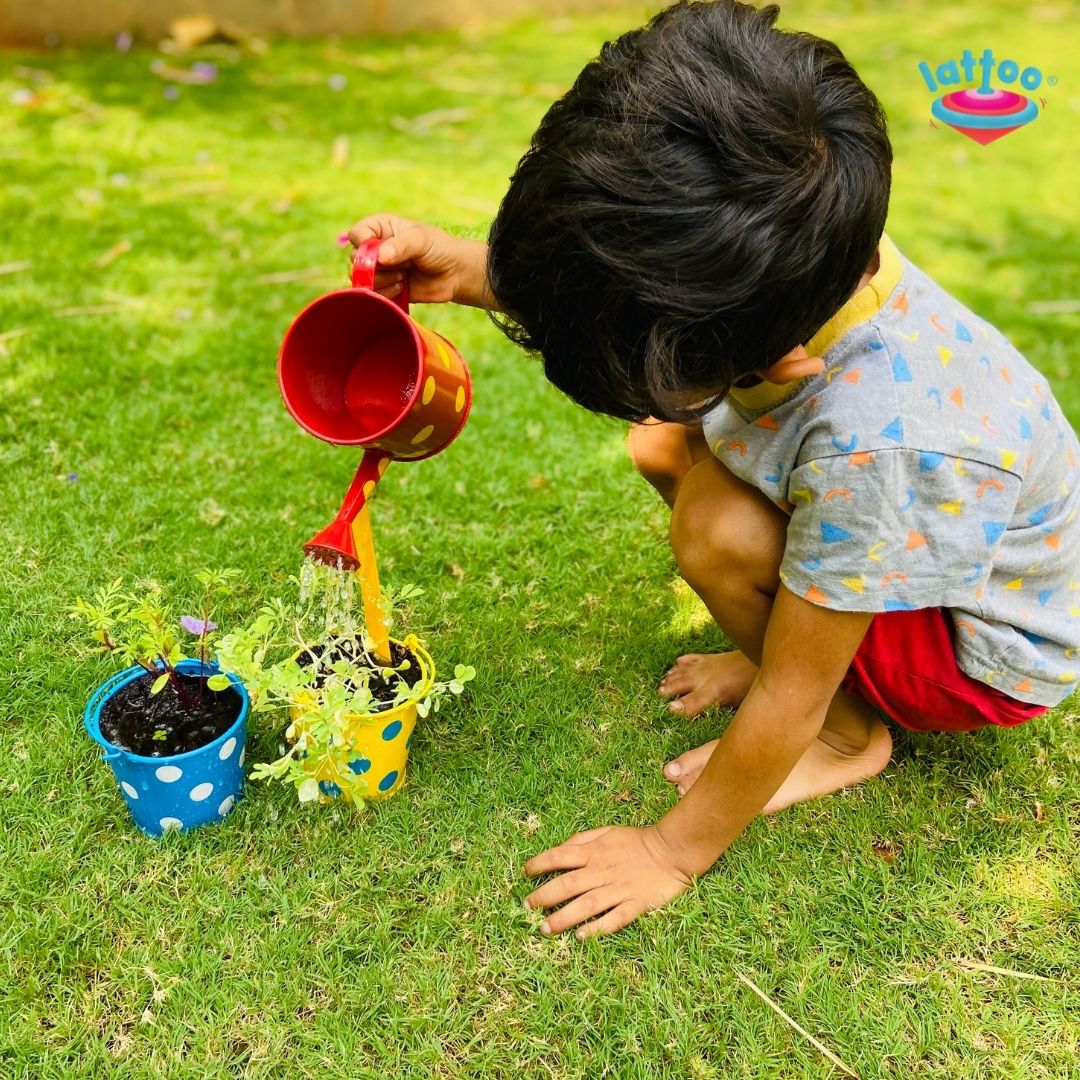 A kid watering the plant with Lattoo's Gardening Kit