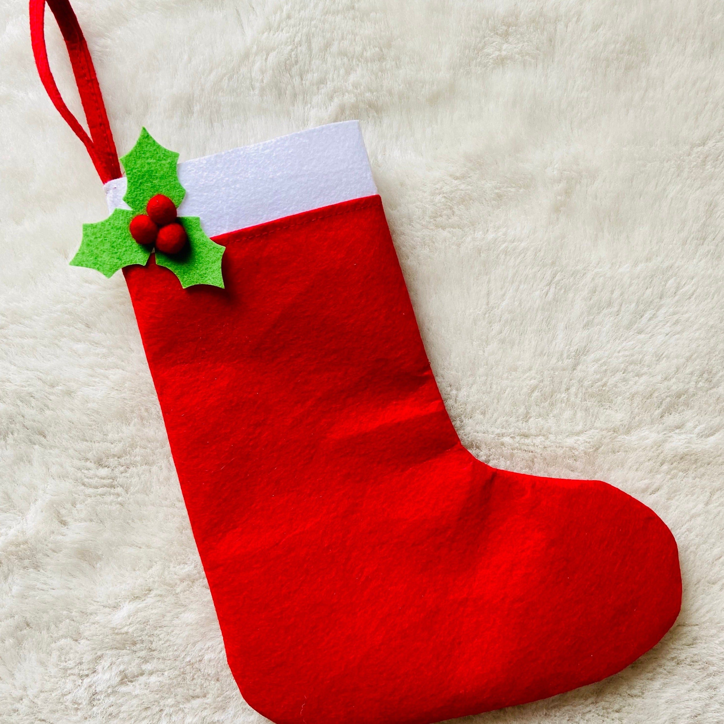 Close-up view of the large Christmas stocking for kids, showcasing high-quality material and festive details.